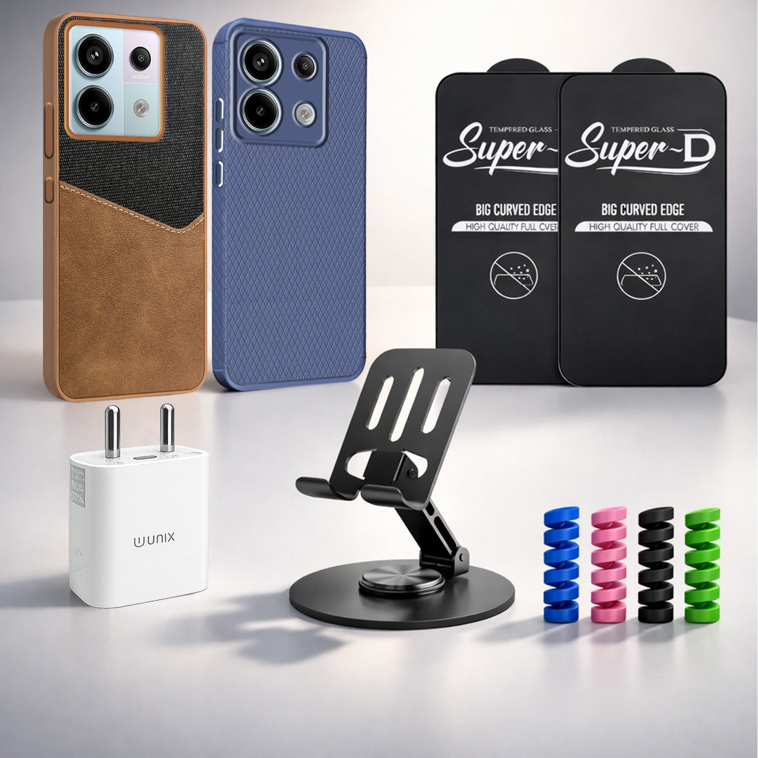 Complete Mobile Care Kit (Get Any 2 Cases+2 Tempered Glass+25W Charger Adapter+Metallic Mobile Stand+Cable Protector)