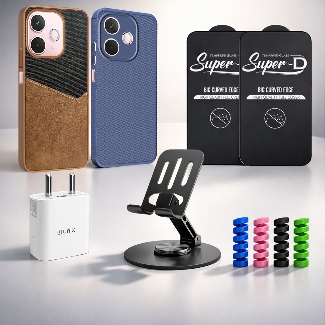 Complete Mobile Care Kit (Get Any 2 Cases+2 Tempered Glass+25W Charger Adapter+Metallic Mobile Stand+Cable Protector)